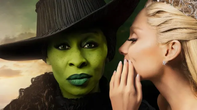 Glinda (Ariana Grade) whispering to Elphaba (Cynthia Erivo) in 'Wicked'