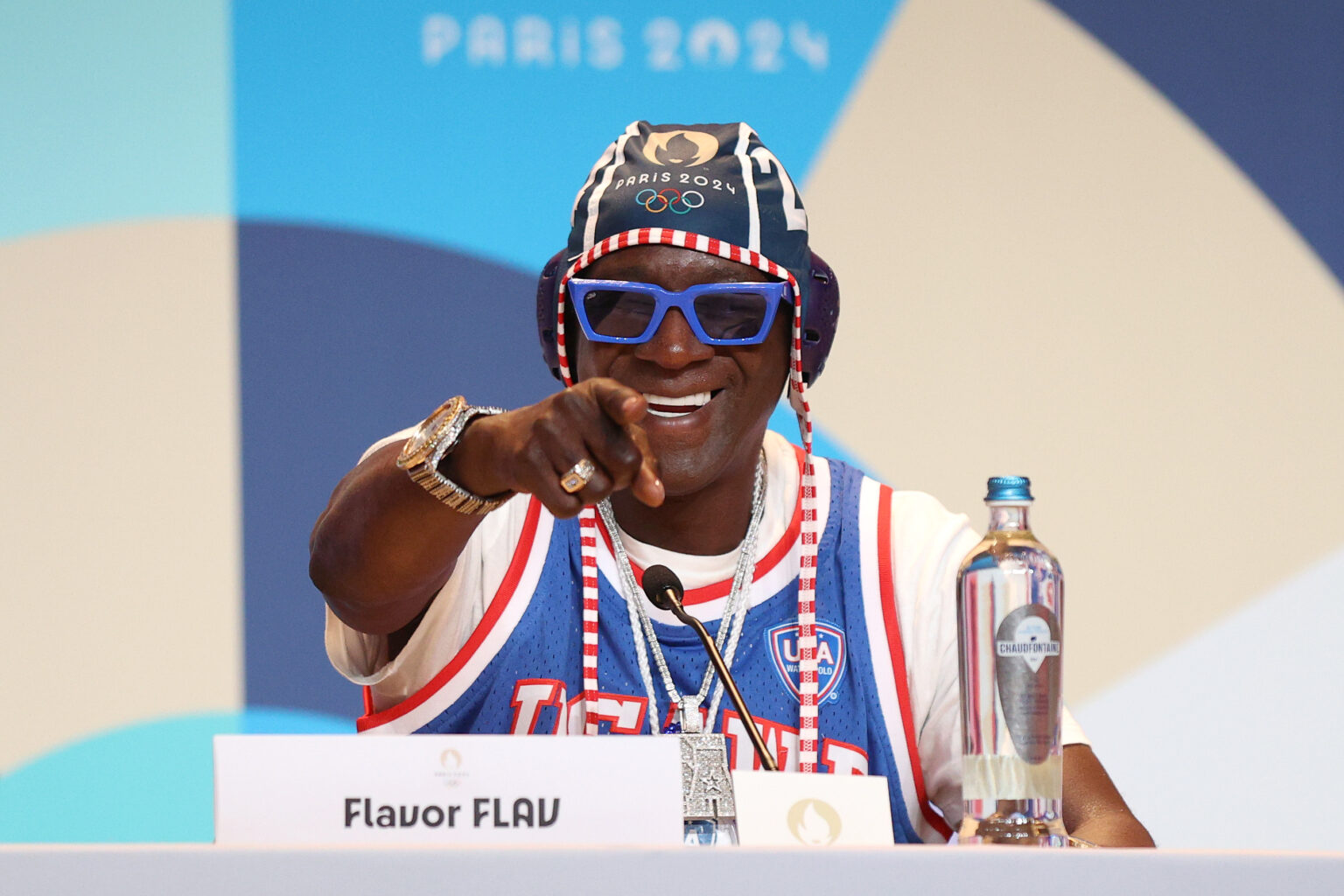 PARIS, FRANCE - JULY 26: Flavor Flav speaks during a Team USA Water Polo press conference at the Main Press Centre on July 26, 2024 in Paris, France.