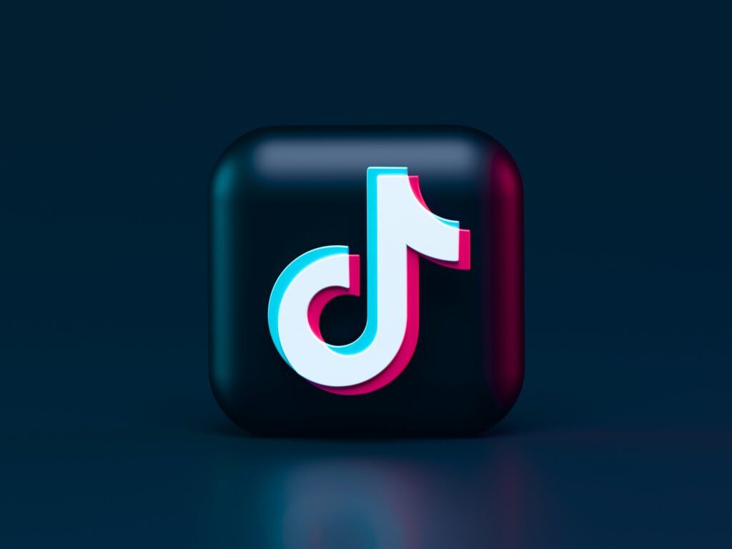 The TikTok logo against a black background