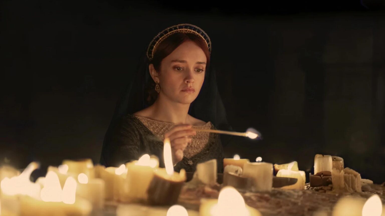 Alicent of the House of the Dragon lights a candle in the Blood and Cheese episode