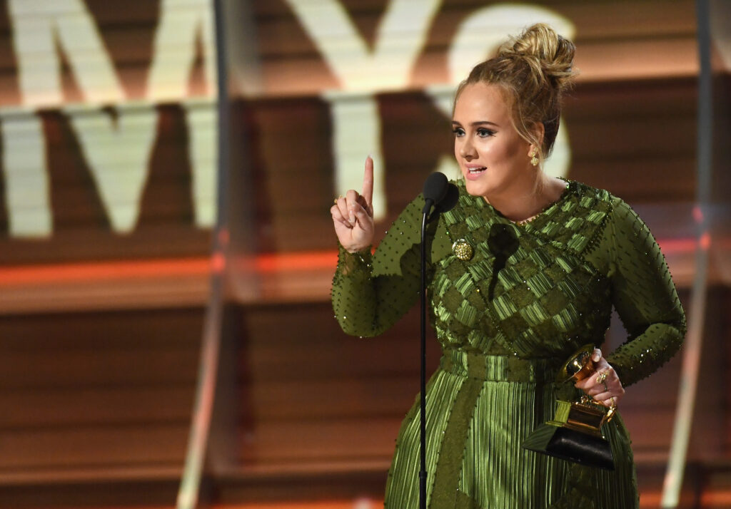 LOS ANGELES, CA - FEBRUARY 12:  Recording artist Adele accepts the award for Record of the Year for 'Hello,' onstage during The 59th GRAMMY Awards at STAPLES Center on February 12, 2017 in Los Angeles, California.  