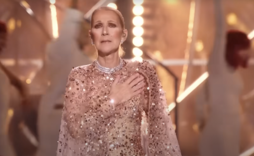 Céline Dion takes in the moment at the Elie Saab 1001 season of Elie Saab show.