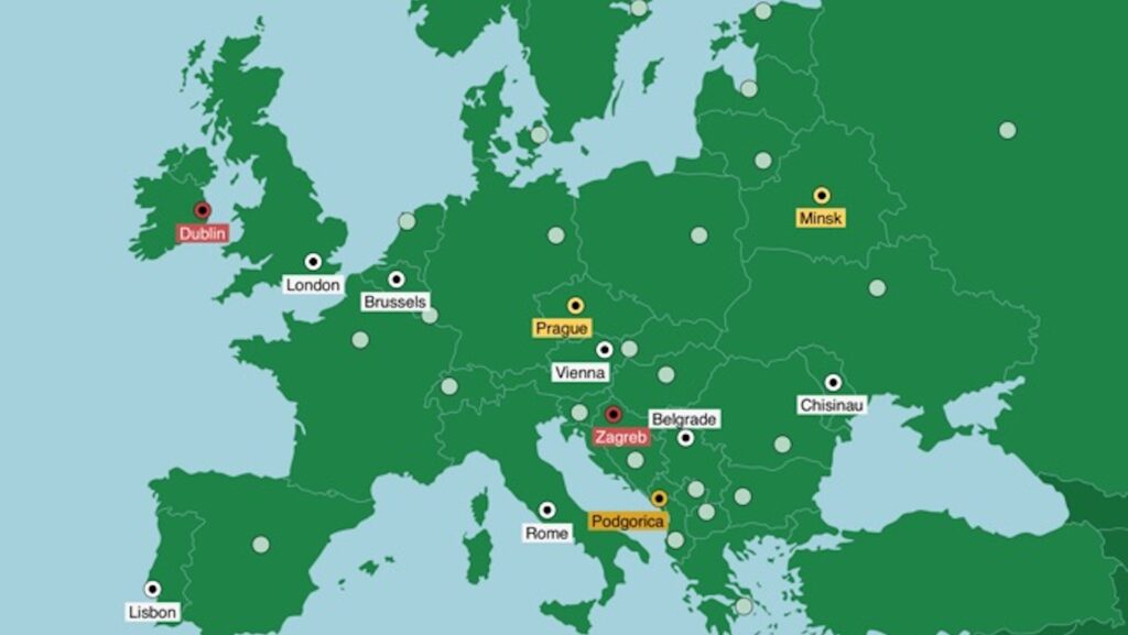 A green map of Europe with the name of certain cities identified.