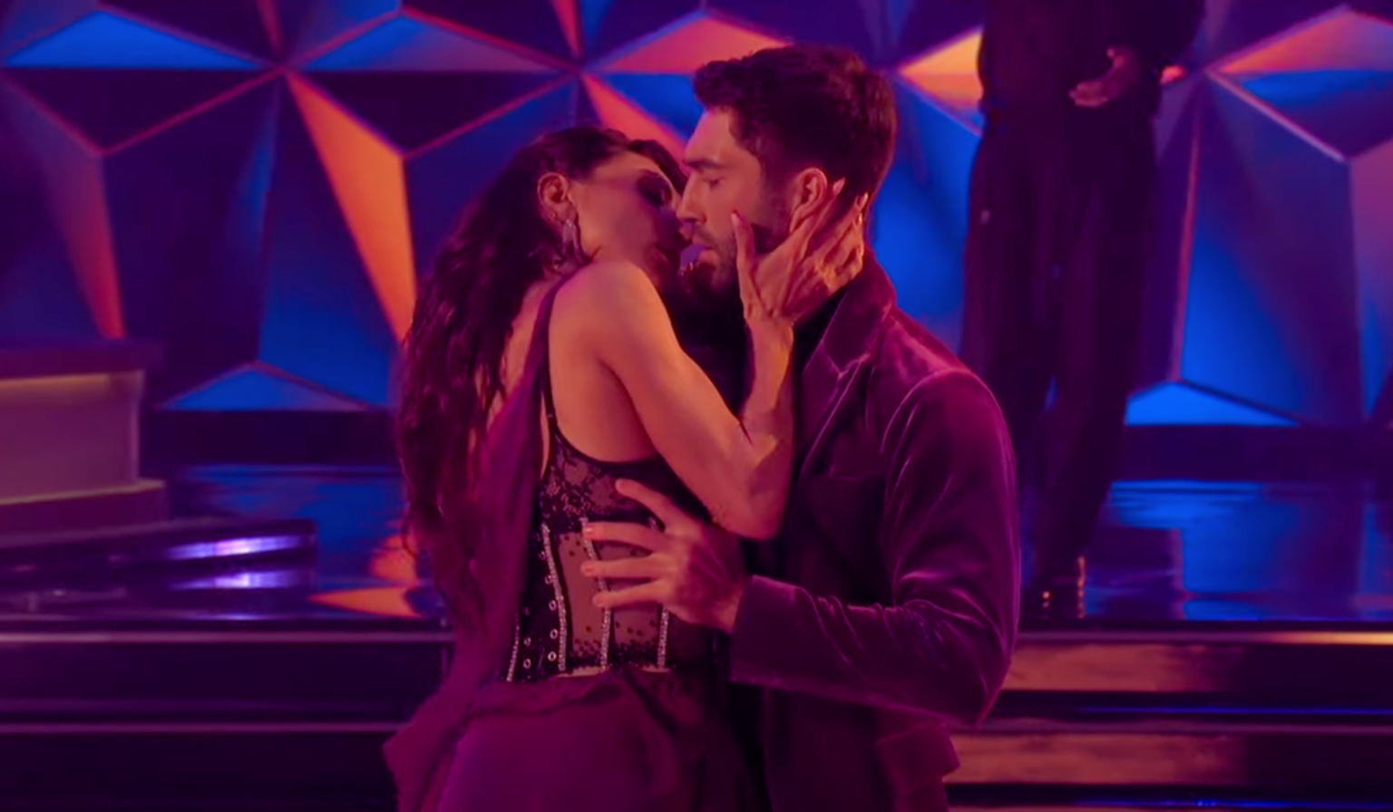 Joey Graziadei and Jenna Johnson in the middle of a dance on Dancing with the Stars